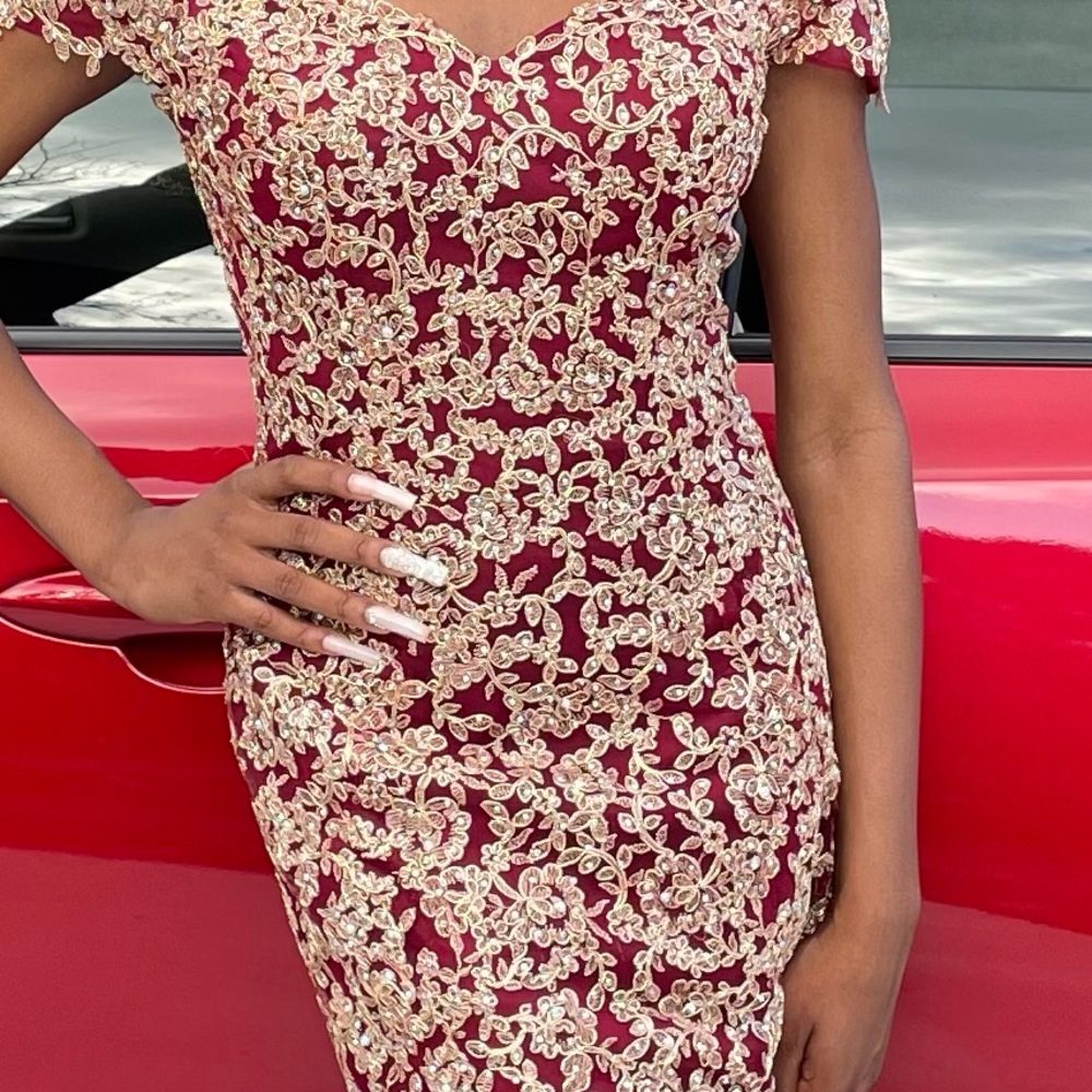Burgundy fit and flare prom dress